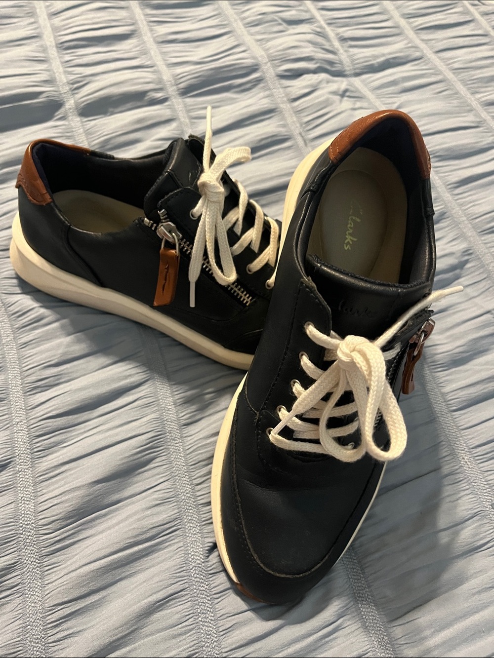 Clarks Women's Black Sneakers with Brown Heel Trim and White Laces